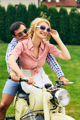 Fototapeta premium beautiful couple on retro motorbike