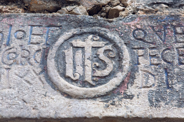 part of the wall with words from the old Church on the mountain