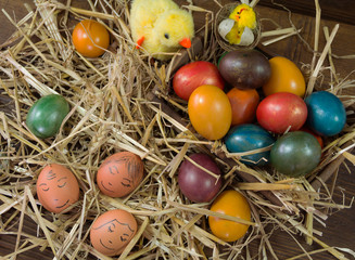 Colorful Easter eggs on wooden background. Easter eggs