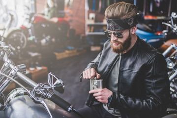 Man in motorcycle shop