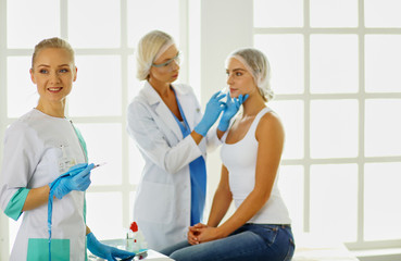 Fototapeta premium woman getting injection. beauty injections and cosmetology