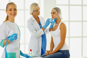 Obraz premium woman getting injection. beauty injections and cosmetology