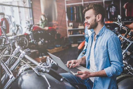 Man in motorcycle shop