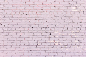 Old shabby brick wall dusty rose color texture