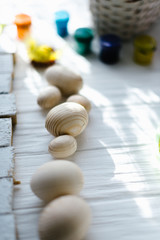 Wooden eggs on a white background. Easter concept
