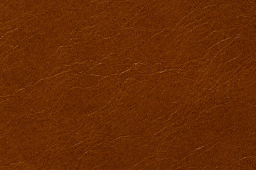 Contrast leather texture in usual brown colour.