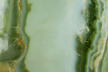 Fototapeten Außergewöhnliche grünliche Onyxstruktur mit kontrastierender Oberfläche. © Dmytro Synelnychenko