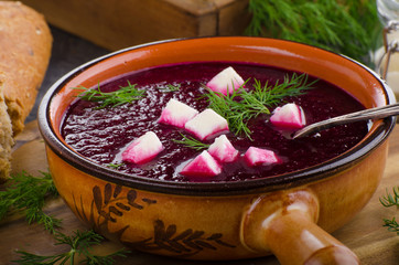Beet soup with cheese and herbs