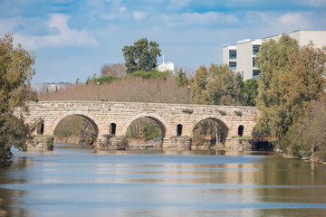 Naklejka premium View of the ancient Roman bridge of the city of Merida, ancient Emerita Augusta in Roman times