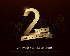 2nd years anniversary celebration gold number and golden ribbons with fireworks on dark background. vector illustration