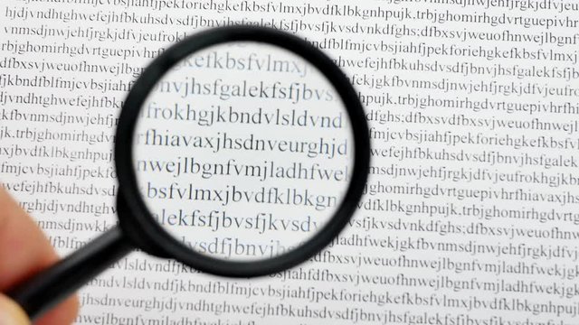 Cipher encryption code or data. Reading word data encrypt with magnifying glass