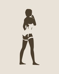 Beautiful sexy fitness girl. Pretty woman wearing lingerie. Front view. Young lady raising her hand to head.