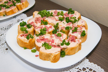 Crostini with different toppings on plate