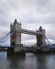 Tower Bridge in London with a transparent British flag over it