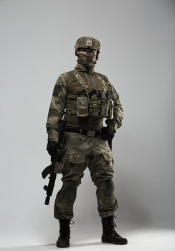 Portrait of full-length military man with gun