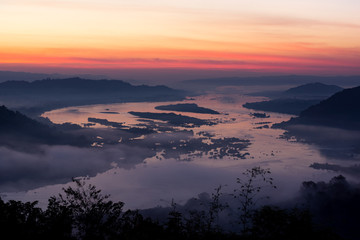 scenery of Mekong river with many fog in morning sunlight, View from viewpoint of Phu huai esun at Nongkhai, Thailand