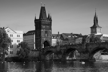 Fototapeta premium Black-and-white photograph of the Charles bridge. Prague's historical center, photo from the river