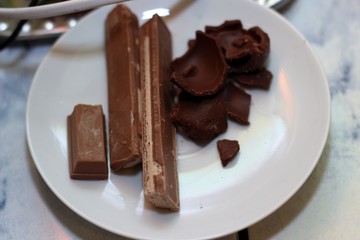 dark chocolate and milk chocolate on a white plate