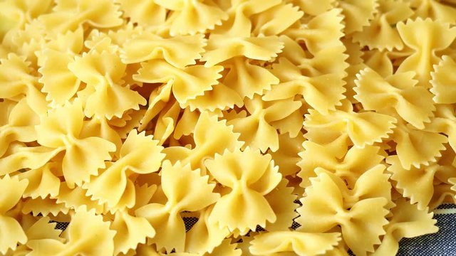 Heap of farfalle pasta.Top view
