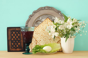 Pesah celebration concept (jewish Passover holiday). Translation for Hebrew Text: egg.