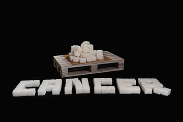 Cancer text written with white refined sugar cubes suggesting dieting concept. No sugar concept...
