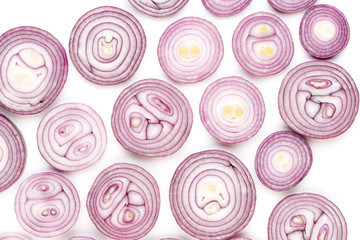 Onion isolated on white background, top view. Wallpaper abstract composition of vegetables.