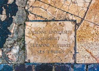 Touristic flagstone informing in French that painter Paul Cezanne attended classes at law school of...