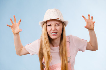 Funny angry teenage woman