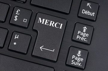 Touche merci sur un clavier d'ordinateur 