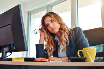 angry businesswoman looking at negative statistic