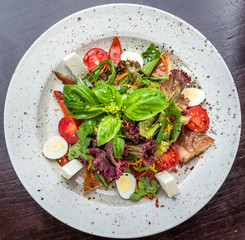 Fish salad - grilled sea bass and vegetables