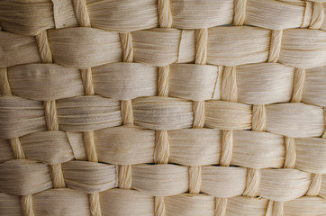 background in the form of a basket made of reed. Vertical and horizontal elementsnnn
