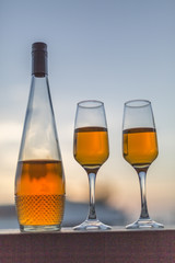 bottle and two glasses