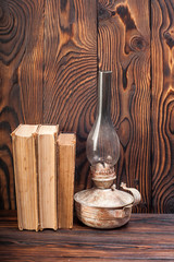 Old books on a wooden background