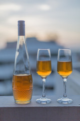 bottle and two glasses