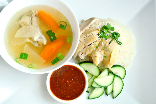 Hainanese chicken rice or steamed chicken and white rice
