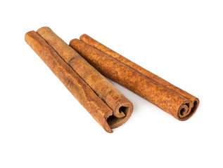 Two cinnamon sticks isolated on white background.
