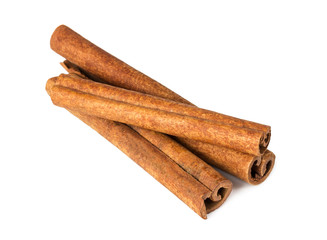 Three cinnamon sticks isolated on white background.