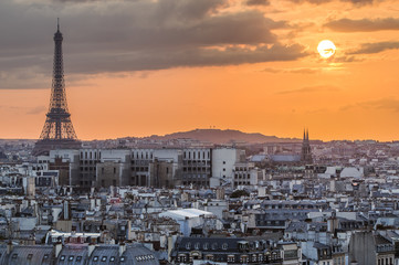 View of Paris with Eiffel tower silhouette at sunset