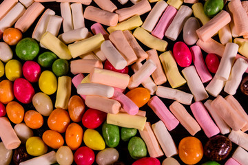 Background of the different multi colored candies. Festive concept