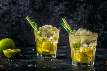 Fresh lime cocktail with ice, selective focus.