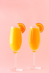 Yellow cocktail on a bright background.