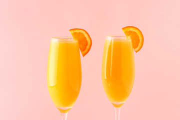 Yellow cocktail on a bright background.