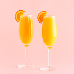 Yellow cocktail on a bright background.