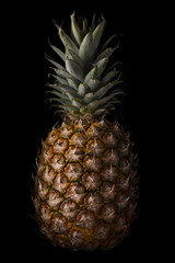 Close-up of pineapple on black background