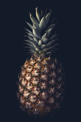 Close-up of pineapple on black background