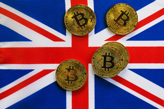 Bitcoin Gold Color on the Flag of United Kingdom. Cryptocurrency on Background of Union Jack Flag - Powered by Adobe