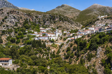 Scenic Dhermi mountain village with school building (in albanian language 