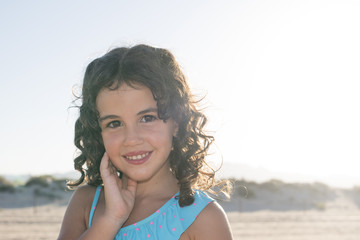 little girl vacationing on the beach