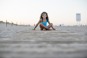 Fototapeta na wymiar little girl vacationing on the beach